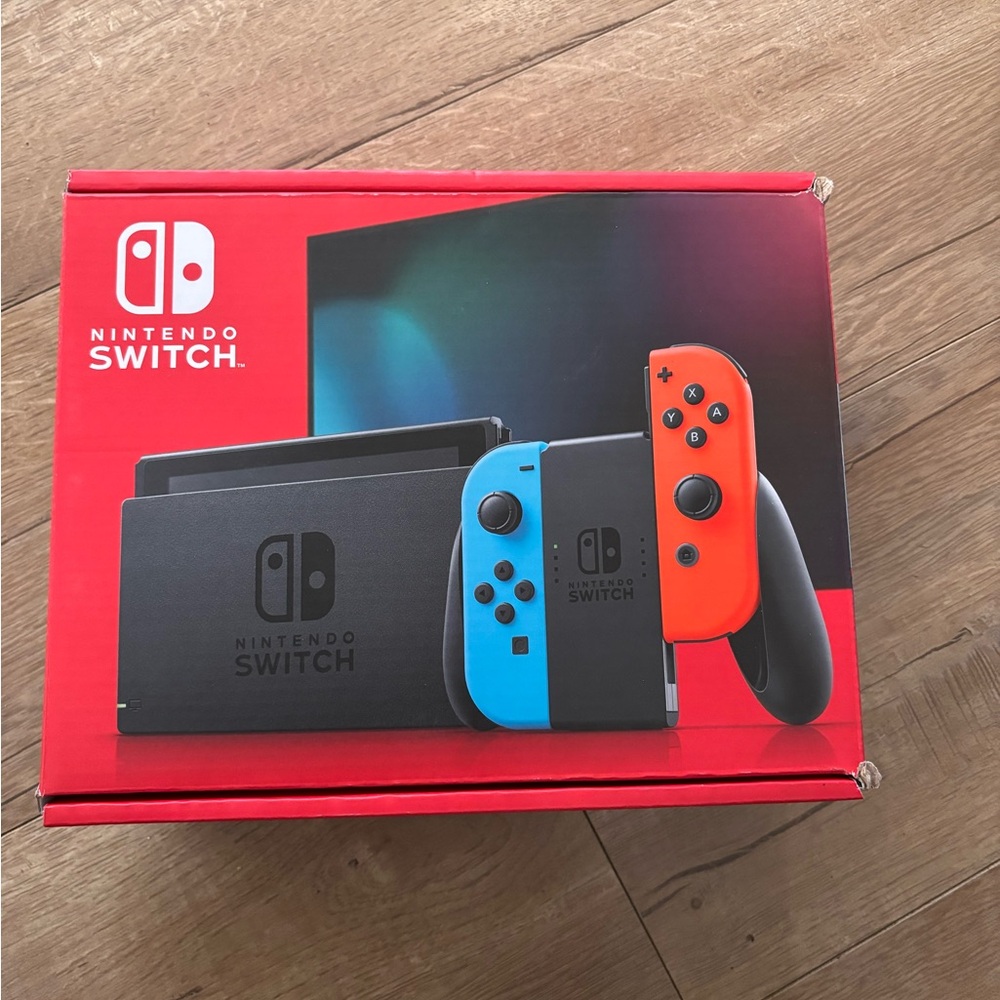 Nintendo Switch Console with Bright Blue and Red Controllers